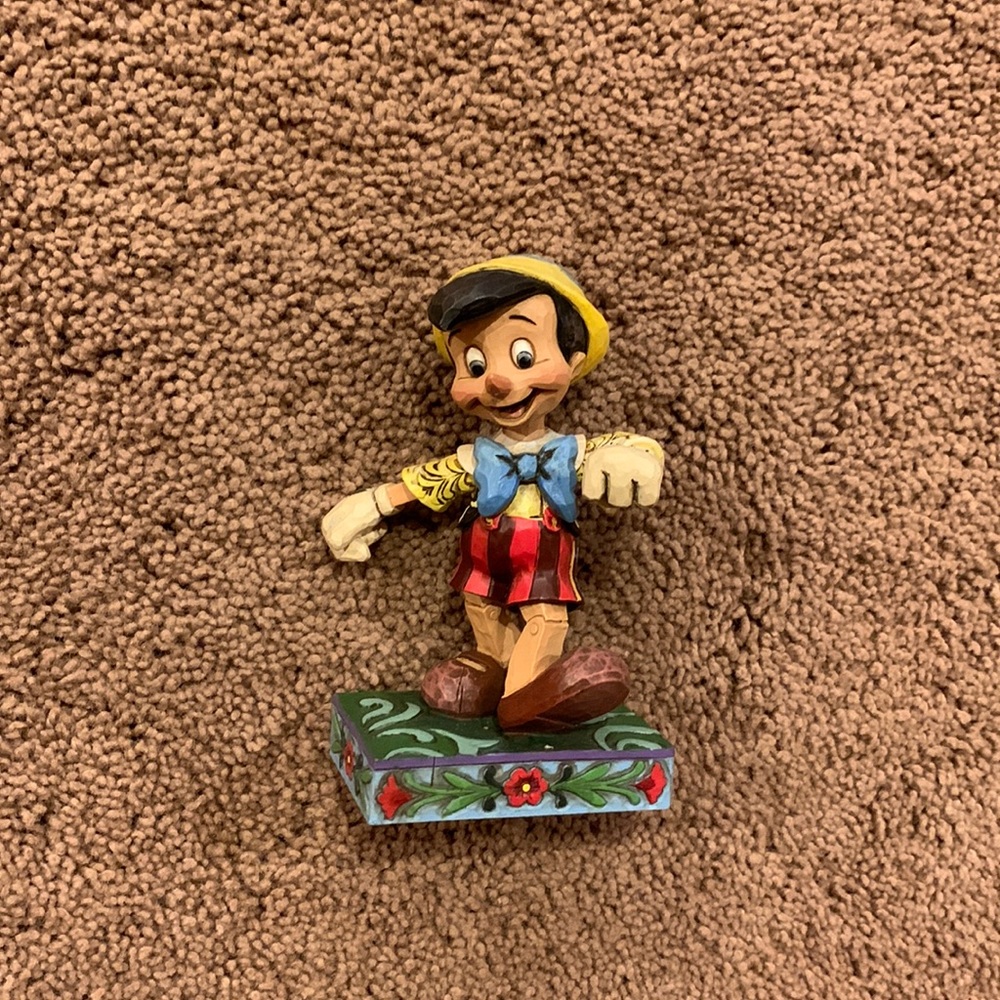 Jim shore pinocchio “lively step” disney collection